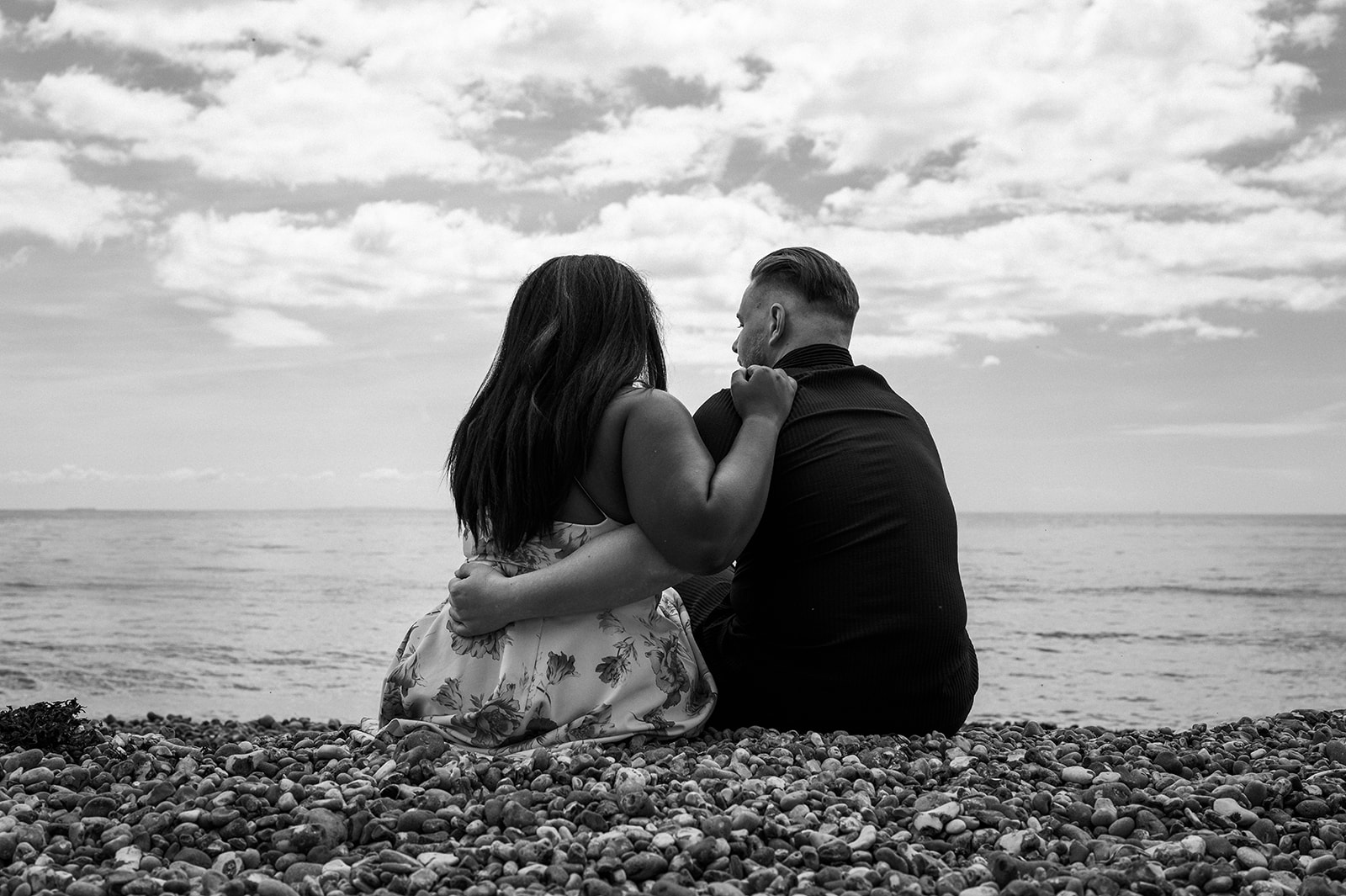 Stephanie and Teodor facing the sea together